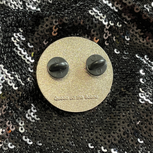 Load image into Gallery viewer, Back of the enamel pin from Queen On The Scene.