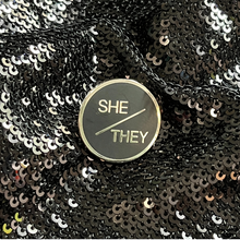 Load image into Gallery viewer, She/They pronoun pin from Queen On The Scene.
