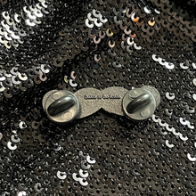 Load image into Gallery viewer, Backside of pink glitter gender fucker enamel pin from Queen On The Scene.