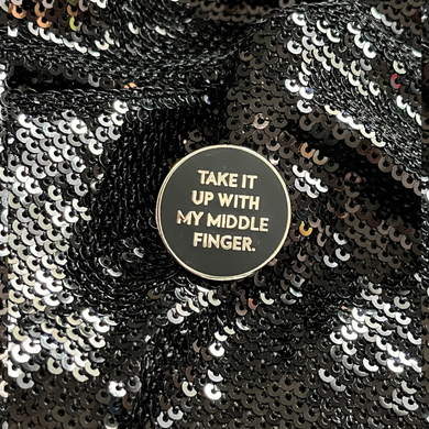 Take it up with my middle finger round enamel pin from Queen On The Scene.