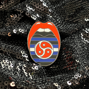 BDSM Pride Pin featuring the KINK and BDSM Pride Flag colors. Features the signature tongue design from Queen On The Scene.
