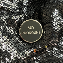 Load image into Gallery viewer, Any pronoun pins from Queen On The Scene features a sleek, round pin with the words &#39;Any Pronouns&#39; on it. Perfect for upscale events, outings, and more. 

