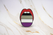 Load image into Gallery viewer, Asexual Pride pin features black, gray, white, and purple colors on the signature tongue design from Queen On The Scene pins.

