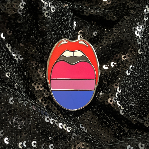 Bisexual pride pin from Queen On The Scene featuring the signature tongue design. 
