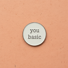 Load image into Gallery viewer, 'You Basic' Snarky Enamel Pin from Queen On The Scene. Round enamel pin with the words 'You Basic' on it with typeface style text.
